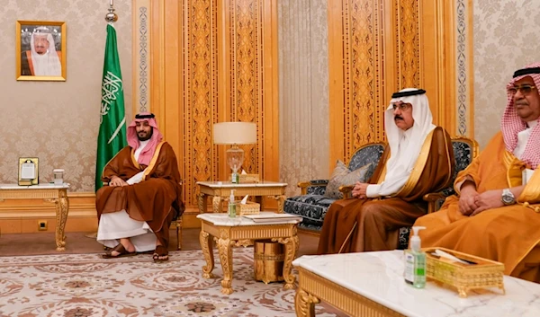 Saudi Crown Prince Mohammed bin Salman, left, and his advisors look on as they meet US Secretary of State Antony Blinken, not pictured, in Riyadh, Saudi Arabia, Wednesday, October 23, 2024 (AP)