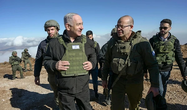 Israel's Prime Minister Benjamin Netanyahu, left, visits Israeli occupation forces in a 'buffer zone' inside Syria, Tuesday, December 17, 2024 (AP)