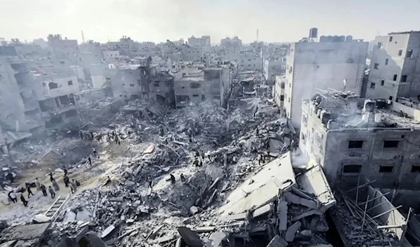 Palestinians check destruction in the aftermath of an Israeli strike on the Jabalia refugee camp in the Gaza Strip on Nov. 1. AFP via Getty Images