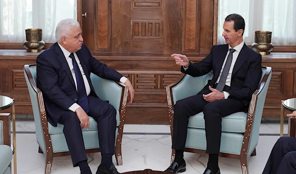 In this photo released by the Syrian official news agency SANA, Syrian President Bashar Assad, right, meets with Iraq's National Security Advisor Faleh al-Fayyad in Damascus, Syria, October 17, 2019. (AP)