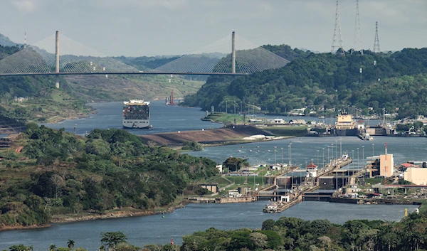 A cargo ship sails through Miraflores locks in the Panama Canal in Panama City, on May 3, 2024. (AP)