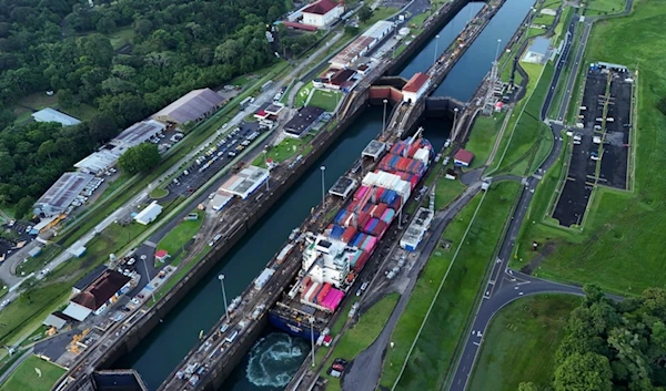 A cargo ship traverses the Agua Clara Locks of the Panama Canal in Colon, Panama, Sept. 2, 2024. (AP)