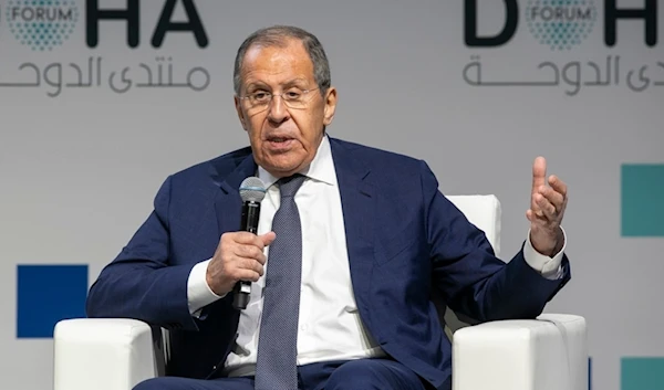 Russian Foreign Minister Sergey Lavrov gestures as he speaks at the Doha Forum in Doha, Qatar, on Saturday Dec. 7, 2024. (AP Photo/Hussein Sayed)