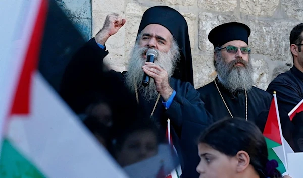 Greek Orthodox Archbishop of Sebastia in occupied al-Quds, Atallah Hanna, delivers a speech during a demonstration in Beit Jala on the outskirts of the occupied west bank city of Beit Lahm, on May 17,2021. (AFP)