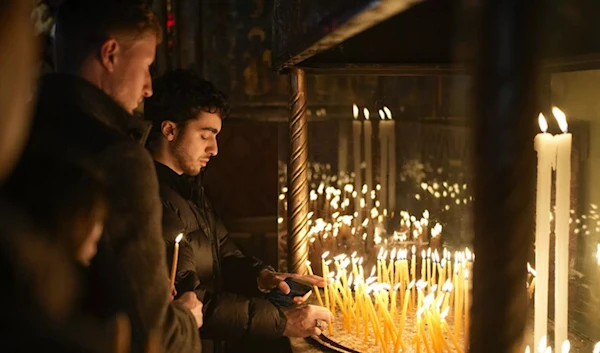 Palestinians pray at the the birthplace of the Christ in the occupied West Bank city of Bethlehem, Tuesday, Dec. 24, 2024 -  (AP)