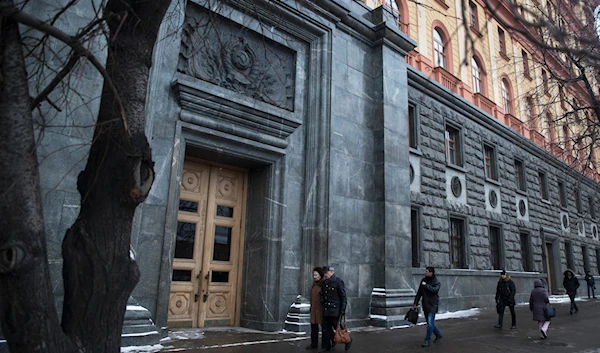 People walk by the main building of the Russian Federal Security Service, former KGB headquarters, in Lubyanka Square in Moscow, Russia, on January 27, 2015. (AP)