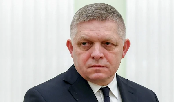 Slovak Prime Minister Robert Fico stands waiting the meeting with Russian President Vladimir Putin at the Kremlin in Moscow, Russia, Sunday, Dec. 22, 2024. (AP)