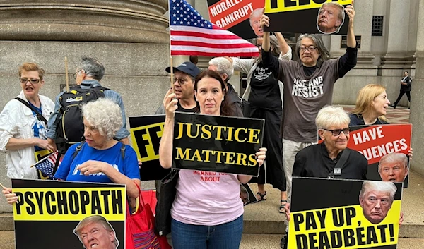 People protesting against Donald Trump are outside a Manhattan federal appeals court in New York on Friday, September 6, 2024. (AP)