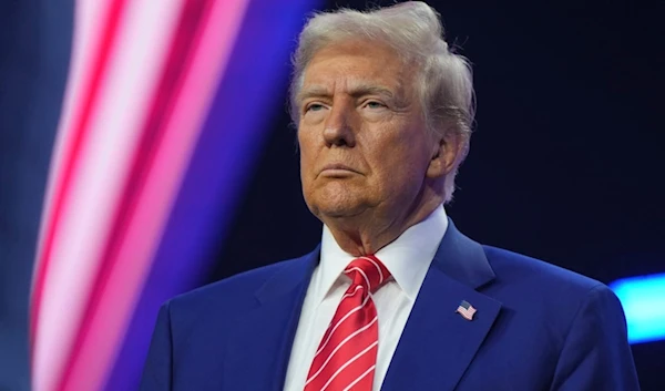 President-elect Donald Trump speaks at AmericaFest, Sunday, Dec. 22, 2024, in Phoenix. (AP Photo/Rick Scuteri)