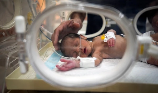 Ali al-Batran, a 20-day-old infant, lies in the intensive care unit with hypothermia at Al-Aqsa Martyrs Hospital in Deir al-Balah, central Gaza, Sunday, Dec. 29, 2024. (AP)