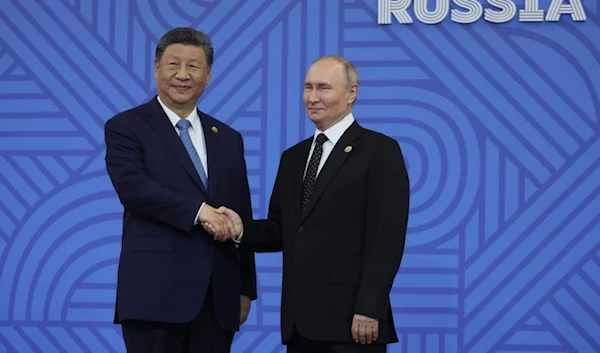 Xi promises 'world peace' in New Year's message to Putin