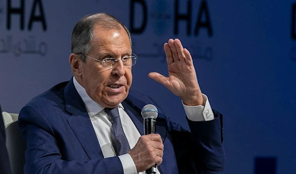 Russian Foreign Minister Sergey Lavrov gestures as he speaks at the Doha Forum in Doha, Qatar, on December 7, 2024. (AP)