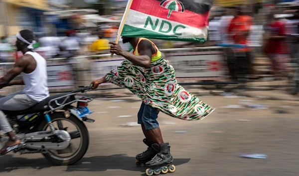 Supporters of opposition candidate and former President John Dramani Mahama celebrate his victory after his opponent conceded in Accra, Ghana, Sunday, Dec. 8, 2024. (AP)