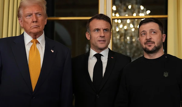 French President Emmanuel Macron, center, poses with President-elect Donald Trump, left, and Ukraine's President Volodymyr Zelensky at the Elysee Palace, on December 7, 2024 in Paris. (AP)