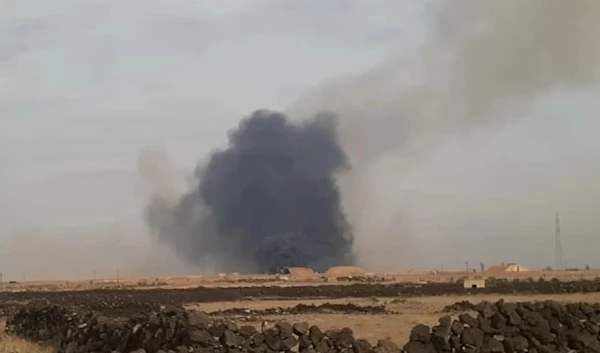 A picture showing violent explosions at the Khalkhala military airbase in southern Syria (Twitter)).