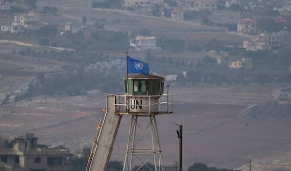 A United Nations flag waves on the top of a tower in a base of the UNIFIL at the Lebanese Blue Line as seen from northern occupied Palestine, Nov. 28, 2024. (AP)