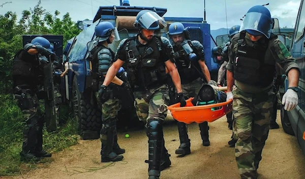 Law enforcers are transporting the body of a constable who got injured during the protests. (Social Media)