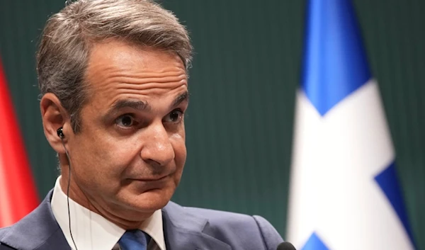 Greek Prime Minister Kyriakos Mitsotakis listens to Turkish President Recep Tayyip Erdogan during a joint news conference in Ankara, Turkey, Monday, May 13, 2024. (AP)