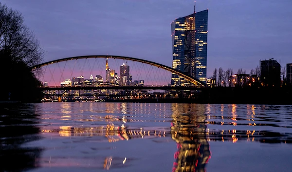 The European Central Bank is reflected in the river Main in Frankfurt, Germany, March 21, 2024. (AP)