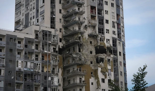 An apartment building damaged in Kharkiv, Tuesday, May 14, 2024. (AP Photo/Andrii Marienko)