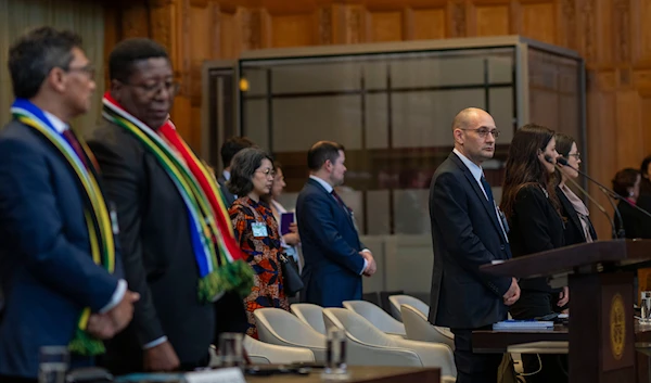 South Africa's and "Israel's" lawyers wait for the start of hearings at the International Court of Justice, in The Hague, Netherlands, on Thursday, May 16, 2024.(AP)