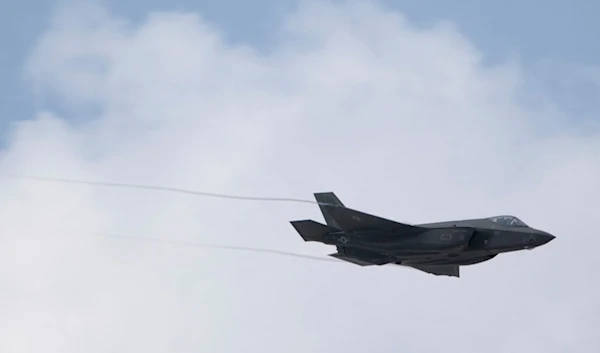 An F-35 Lightning conducts a fly-by at the Dubai Air Show in Dubai, United Arab Emirates, Thursday, Nov. 16, 2023. (AP Photo/Jon Gambrell)