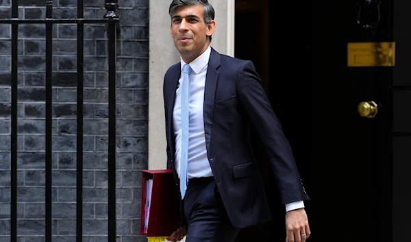 Britain's Prime Minister Rishi Sunak leaves 10 Downing Street to attend the weekly session of Prime Ministers Questions in Parliament in London on May 15, 2024. (AP)