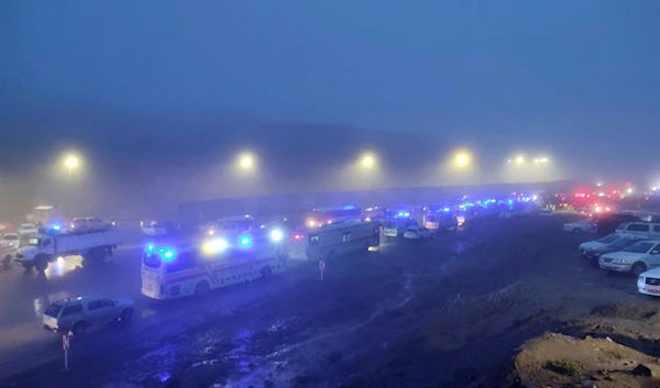 Rescue vehicles are seen following a crash of a helicopter carrying Iran's President Ebrahim Raisi, in Varzaqan , northwestern Iran on May 19 2024 (AFP)