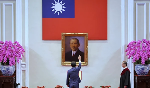 In this photo released by the Taipei News Photographer, President-elect Lai Ching-te gets sworn in as Taiwan's new president during his inauguration ceremony in Taipei, Taiwan, Monday, May 20, 2024 (AP)