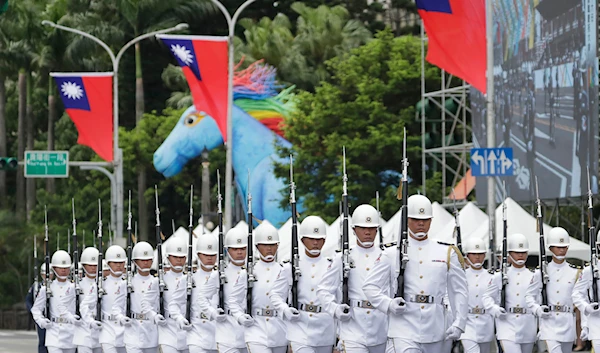 Members of an honor guard march during an inauguration ceremony of Taiwan's President Lai Ching-te in Taipei, Taiwan, Monday, May 20, 2024. (AP)