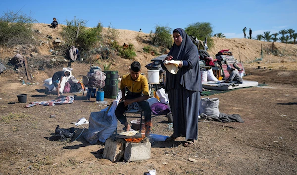 Displaced Palestinians arrive in central Gaza after fleeing from the southern Gaza city of Rafah in Deir al-Balah, Gaza Strip, on Wednesday, May 7, 2024.(AP)