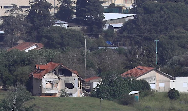 An Israeli settler house in the northern Israeli-occupied border town of Metula, which was damaged by Hezbollah shelling, is seen from the Lebanese side of the Lebanese-Israeli border village of Kfar Kila, south Lebanon, Thursday, April 18, 2024. (AP)