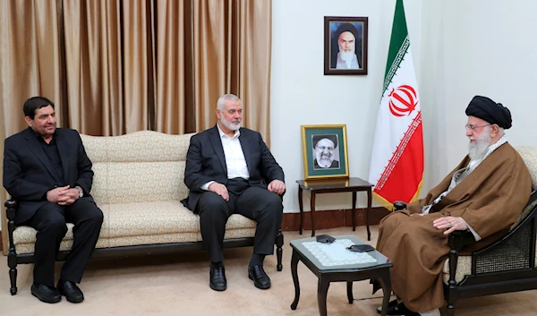 Iranian Leader Ayatollah Ali Khamenei, Hamas chief Ismail Haniyeh, and Iranian acting President Mohammad Mokhber, during their meeting in Tehran, Iran, May 22, 2024 (AP)