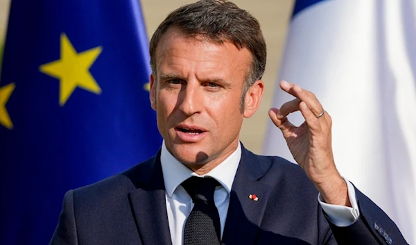 French President Emmanuel Macron attends a press conference at Bellevue Place in Berlin, Germany, Sunday, May 26, 2024. (AP Photo/Markus Schreiber)