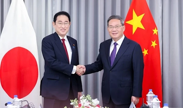 Chinese Premier Li Qiang and Japanese Prime Minister Fumio Kishida ahead of their first official meeting, in Seoul on Sunday. (social media)