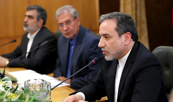 Iran's (at that time) Deputy Foreign Minister Abbas Araghchi, right, speaks in a press briefing in Tehran, Iran, Sunday, July 7, 2019 (AP Photo/Ebrahim Noroozi)