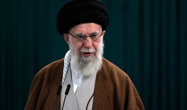 Iranian Supreme Leader Ayatollah Ali Khamenei speaks with media members after he voted for the parliamentary runoff elections, in Tehran, Iran, Friday, May 10, 2024. (AP)