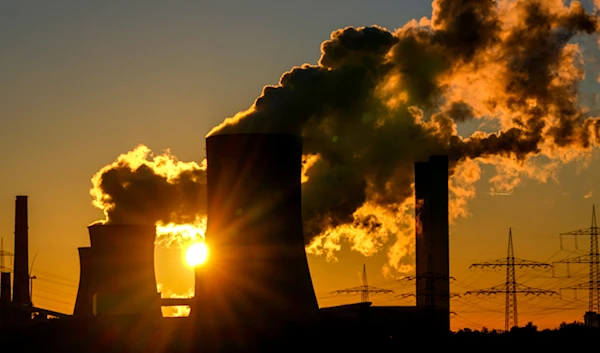 This Sunday, Oct. 24, 2021 taken photo shows chimneys of the coal-fired power station in Niederaussem, Germany. (AP)