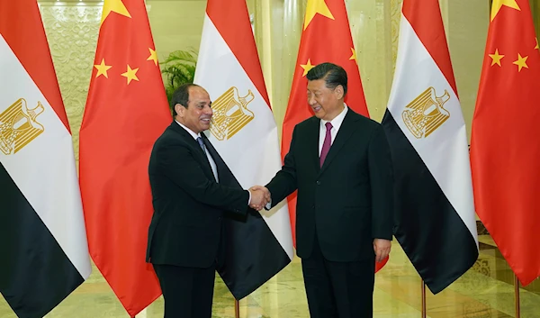 Chinese President Xi Jinping, right, shakes hands with Egypt President Abdel Fattah el-Sisi before a bilateral meeting of the Second Belt and Road Forum at the Great Hall of the People on Thursday, April 25, 2019 in Beijing, China.(AP)