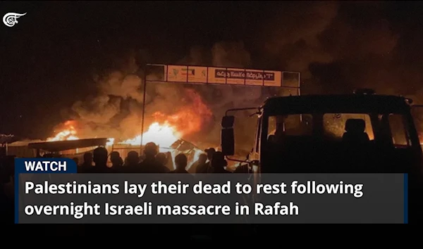 Palestinians lay their dead to rest following overnight Israeli massacre in Rafah