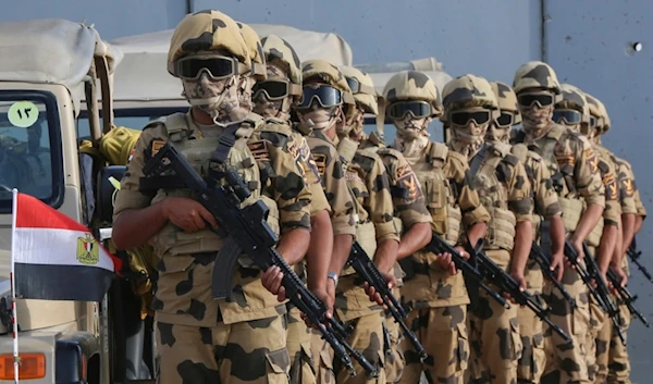 Military personnel stand alert at the Rafah border crossing between Egypt and Gaza Strip, in Rafah, Egypt, Tuesday, Oct. 31, 2023. (AP)