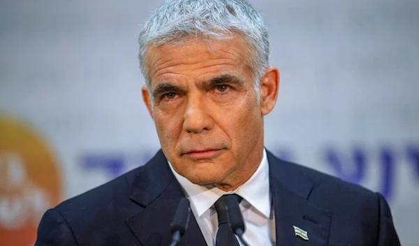 In this May 6, 2021, file photo, Israeli opposition leader Yair Lapid listens during a news conference in "Tel Aviv", Palestine. (AP)