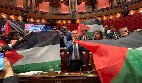 Italian 5 star movement MPs raise Palestinian flag in the Italian parliament, 28 March, 2024 (Social Media)