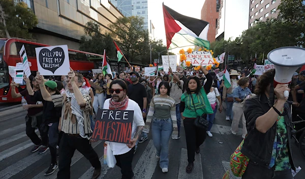 People march against the Israeli war on Gaza and in support of the Palestinians in Gaza, in Mexico City, Sunday, Nov. 5, 2023. (AP)