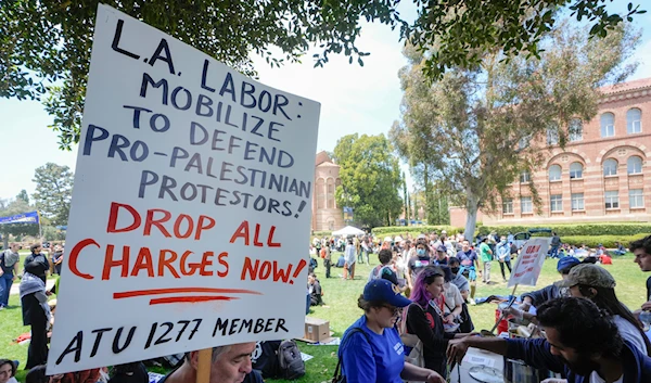 UCLA workers, students and supporters get lunch after a rally at Royce Quad in the University of California, Los Angeles, UCLA campus Tuesday, May, 28, 2024 (AP)