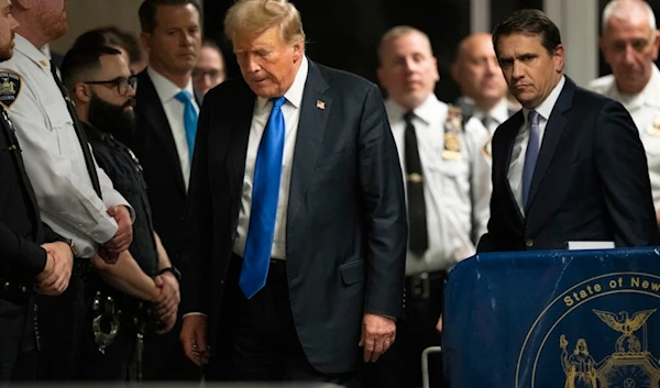 Former President Donald Trump walks outside of Manhattan Criminal Court after a jury convicted him of felony crimes, May 30, 2024, in New York. (AP)