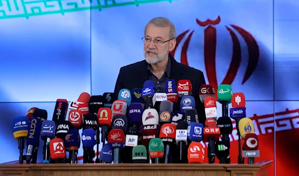 Former Iran's parliament speaker Ali Larijani speaks with media after registering his name as a candidate for the June 28 presidential elections at the Interior Ministry in Tehran, Iran, on May 31, 2024. (AP)