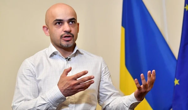 Ukrainian lawmaker Mustafa Nayyem gestures as he speaks to an AFP journalist in his office in Kiev on March 19, 2019. (AFP)