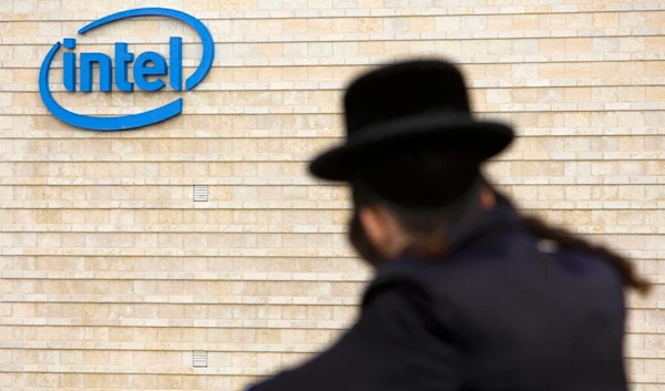 In this file photo taken on Saturday, Nov. 14, 2009, an ultra-orthodox Jewish man is seen next to Intel's al-Quds office building (AP Photo)