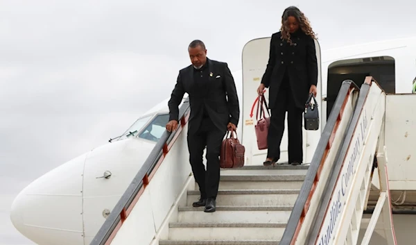 Malawi Vice President Saulos Chilima,left, and his wife Mary disembark from a plane upon his return from South Korea in Lillongwe, Sunday, June 9, 2024. (AP)